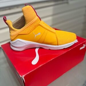 Yellow and white puma sneakers